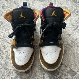 Jordan Black and Gold Interior Sneakers